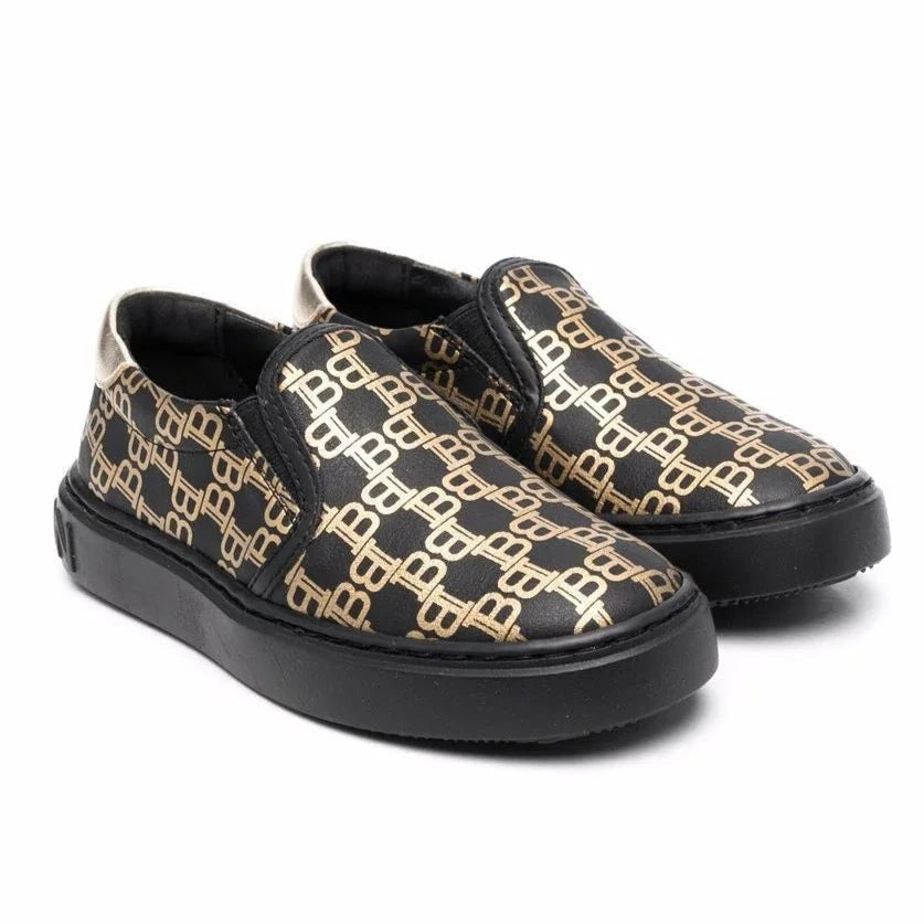 Balmain Kids Monogram Allover Print Slip-On Trainers in black with gold – view 1 of 1