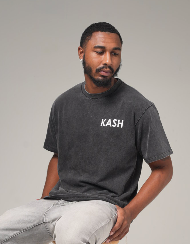 Model seated in the grey wash Maison Kash tee, front