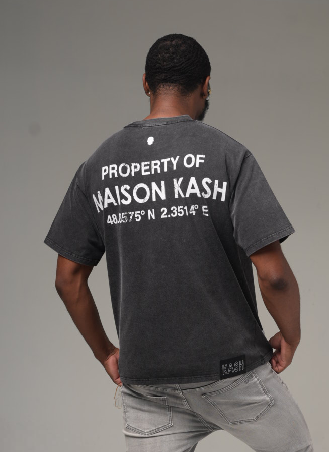 Model showing the back of the grey wash tee: Property of Maison Kash