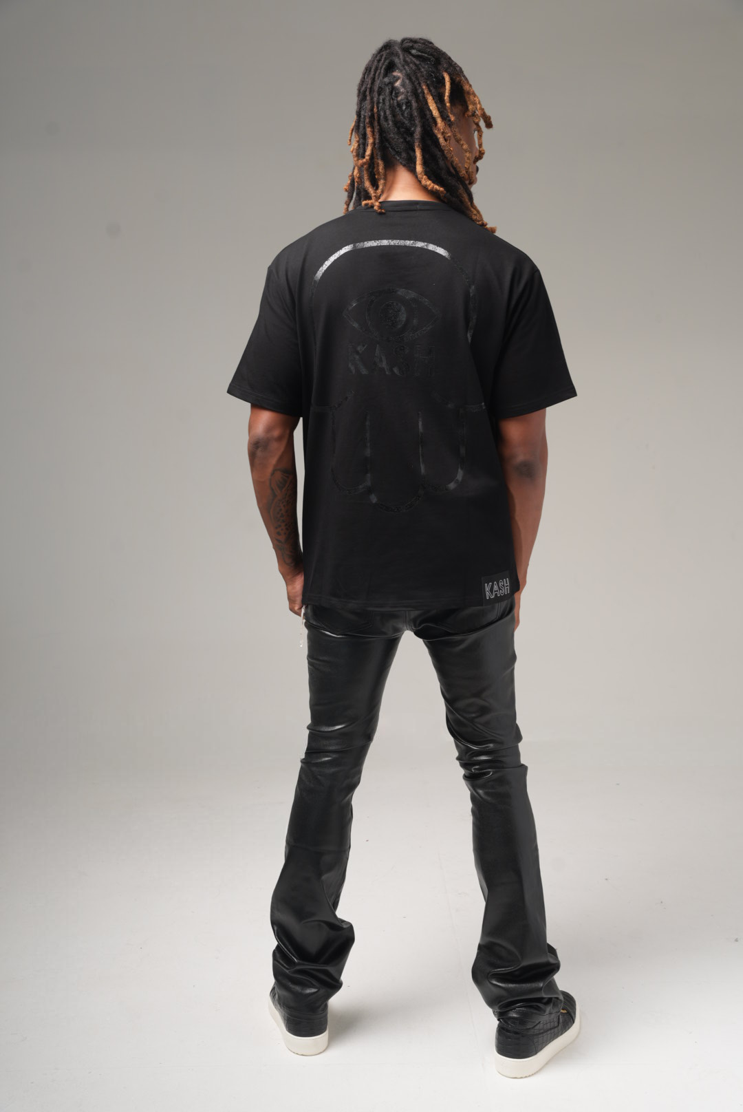 Kash Vegan Leather D-Stacked Pants in black, faux leather stacked pants – view 9 of 10