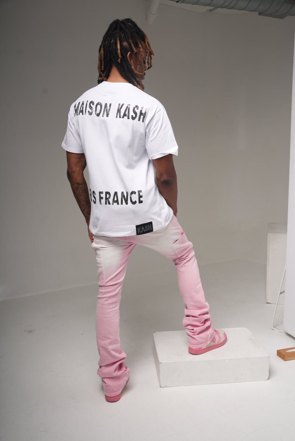 Maison Kash logo tee in white on model, back graphic