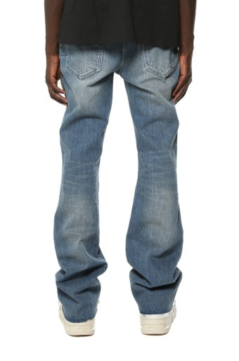 Purple Brand Vintage Heavy Destroy jeans in light indigo, back on model