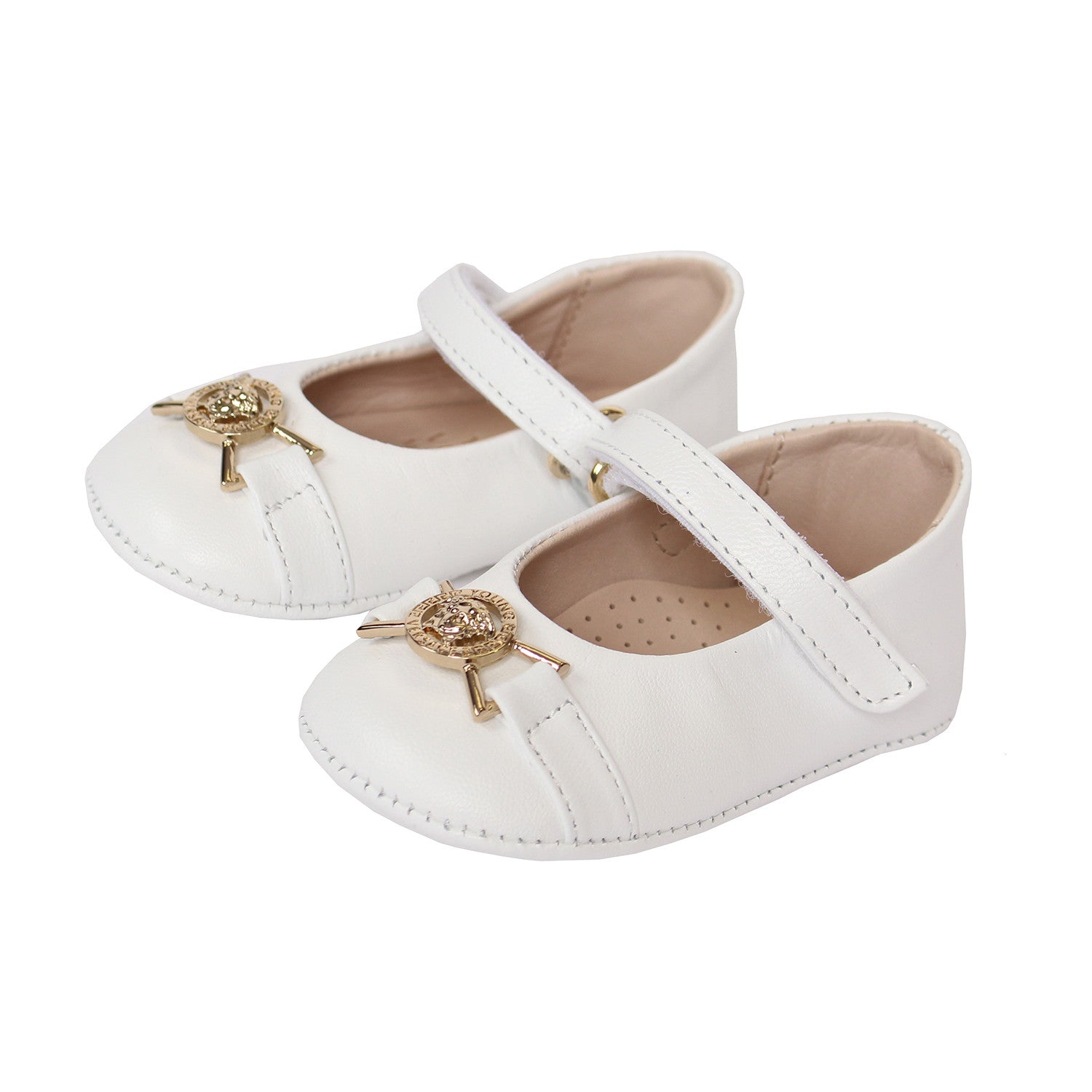 white and gold versace loafers